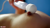 Using sex toy on erect nipple