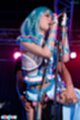 Thighs parted at microphone