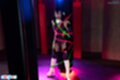 Tied up standing wearing white boots