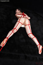 Face down tied up with shibari rope