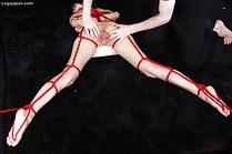 Yuuki Ryo lying on her front nude tied up with shibari rope having her pussy exposed bare feet