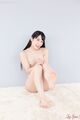 Kasugano yui seated nude legs raised bare feet