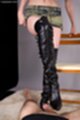Wearing black boots teasing cock