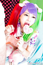 Licking lollipop giving handjob